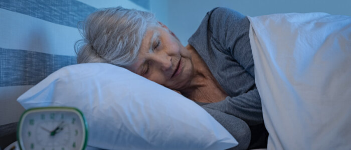 Old,Woman,In,Grey,Hair,Sleeping,Peacefully,At,Night,Time